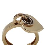 Gold ring with heart pendant
