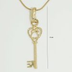 Key to Secrets gold pendant