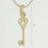 Key to Secrets gold pendant
