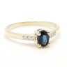 Gold ring with sapphire and brilliant-cut stones