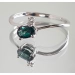 Unique toi et moi diamond ring with a 0.535-carat sapphire stone in white gold