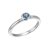 White gold ring with blue topaz in a button setting