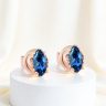 Rose gold stud earrings with London topaz stones