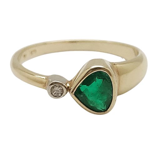 Gold ring with diamonds and emeralds