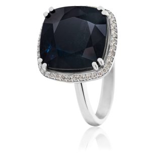   Unique white gold deep blue sapphire ring with diamond stones