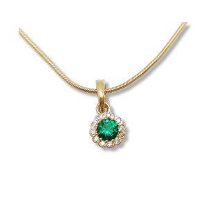 Small gold pendant with green stone