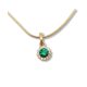 Small gold pendant with green stone