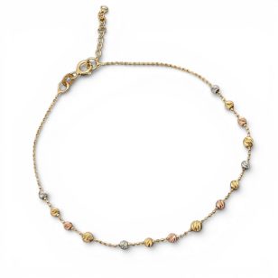 Thin gold bracelet with engraved tricolor spheres