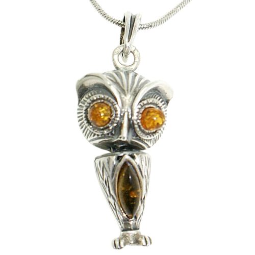 Antique silver pendant with amber owl