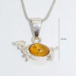 Silver dog pendant with amber dachshund