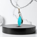 Silver pendant with turquoise stone