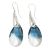 Silver drop / dangle earrings with a unique blue hue