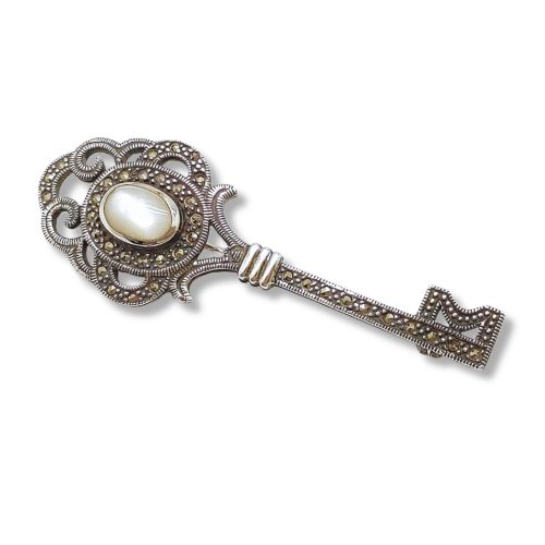 Silver key brooch with marcasite and mother-of-pearl