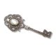 Silver key brooch with marcasite and mother-of-pearl