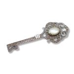 Silver key brooch with marcasite and mother-of-pearl