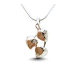 Silver leaf pendant with zirconia stones