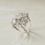 Silver cocktail ring with asymmetrical zirconia stones