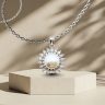 Silver sun pendant with pearl