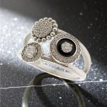 Black triple hoop silver ring with stones