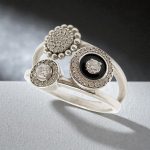 Black triple hoop silver ring with stones