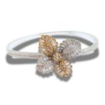 Two-tone silver bracelet with flower pattern