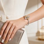 Two-tone silver bracelet with flower pattern