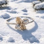 Two-tone silver bracelet with flower pattern