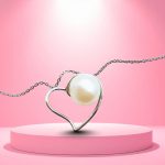 Silver heart pendant with a pearl