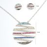   Silver jewelry set with necklace and earrings featuring colorful circles