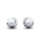 Silver pearl earrings with zirconia stones