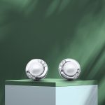 Silver pearl earrings with zirconia stones