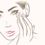 Silver pearl earrings with zirconia stones