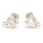 Silver earrings with sparkling cat heads