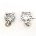 Silver earrings with sparkling cat heads