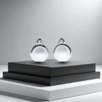 Silver pearl stud earrings with zirconia stones