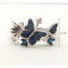 Silver butterfly ring with sapphire-blue zirconia