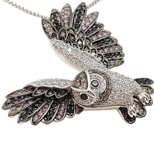 Silver owl pendant with black and brown zirconia stones