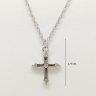 Silver chain with a small cross pendant