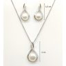   Silver jewelry set with pendant and earrings featuring pearls and zirconia stones