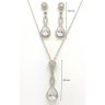   Silver drop jewelry set with earrings, necklace, and pendant featuring zirconia stones