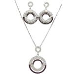 Silver jewelry set with pendant and earrings featuring black and white zirconia