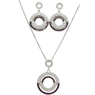   Silver jewelry set with pendant and earrings featuring black and white zirconia