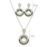   Silver jewelry set with pendant and earrings featuring black and white zirconia