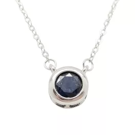Silver necklace with sapphire stone in a button setting