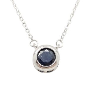 Silver necklace with sapphire stone in a button setting