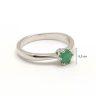 Silver ring with a green emerald stone
