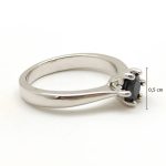 Silver engagement ring with round blue sapphire stone