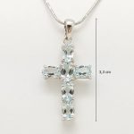Silver cross pendant with genuine blue topaz
