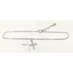 Silver bracelet with a small cross pendant