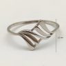 Silver ring with wave pattern